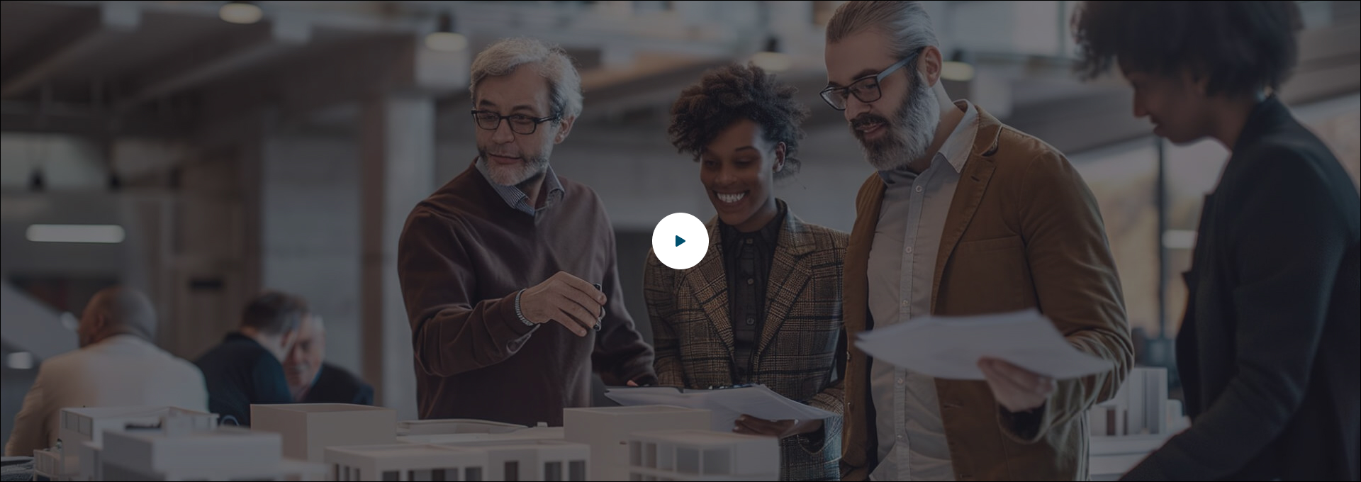 Real estate professionals reviewing a development model